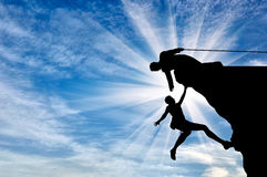 climber-helps-friend-giving-helping-hand-mountains-day-alpinist-submits-cliff-concept-mountaineering-80904842